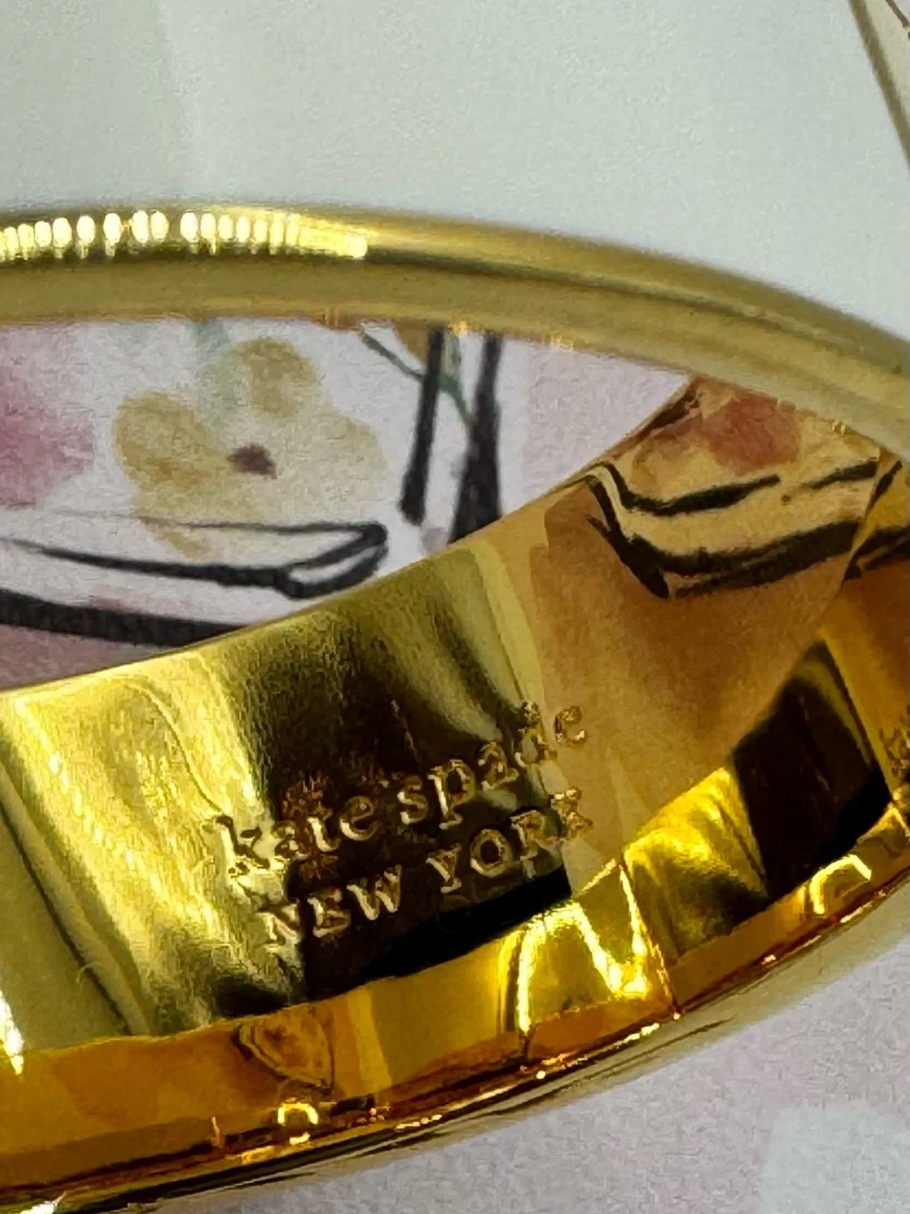 kate spade Heritage Spade Wide Enamel Bangle in Off White with Gold Accents - Picture 5 of 9